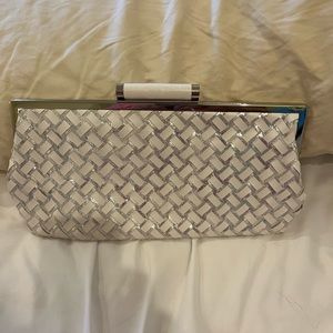 White/silver clutch bag